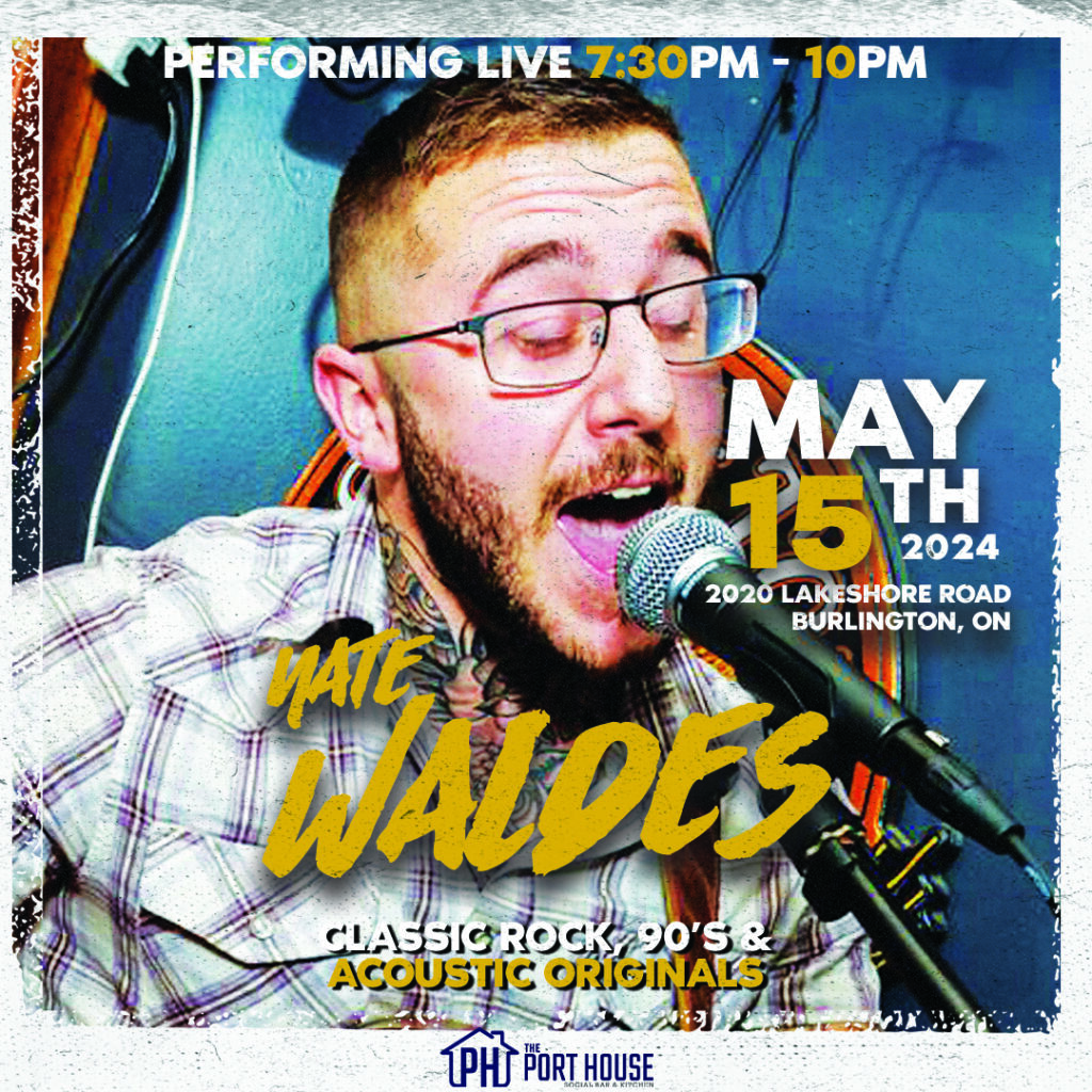 Nate Waldes Singing into a mic. Performing at The Port House in Burlington May 15